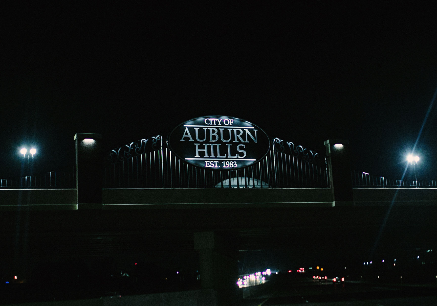 Auburn Hills fabricated bridge installation at night